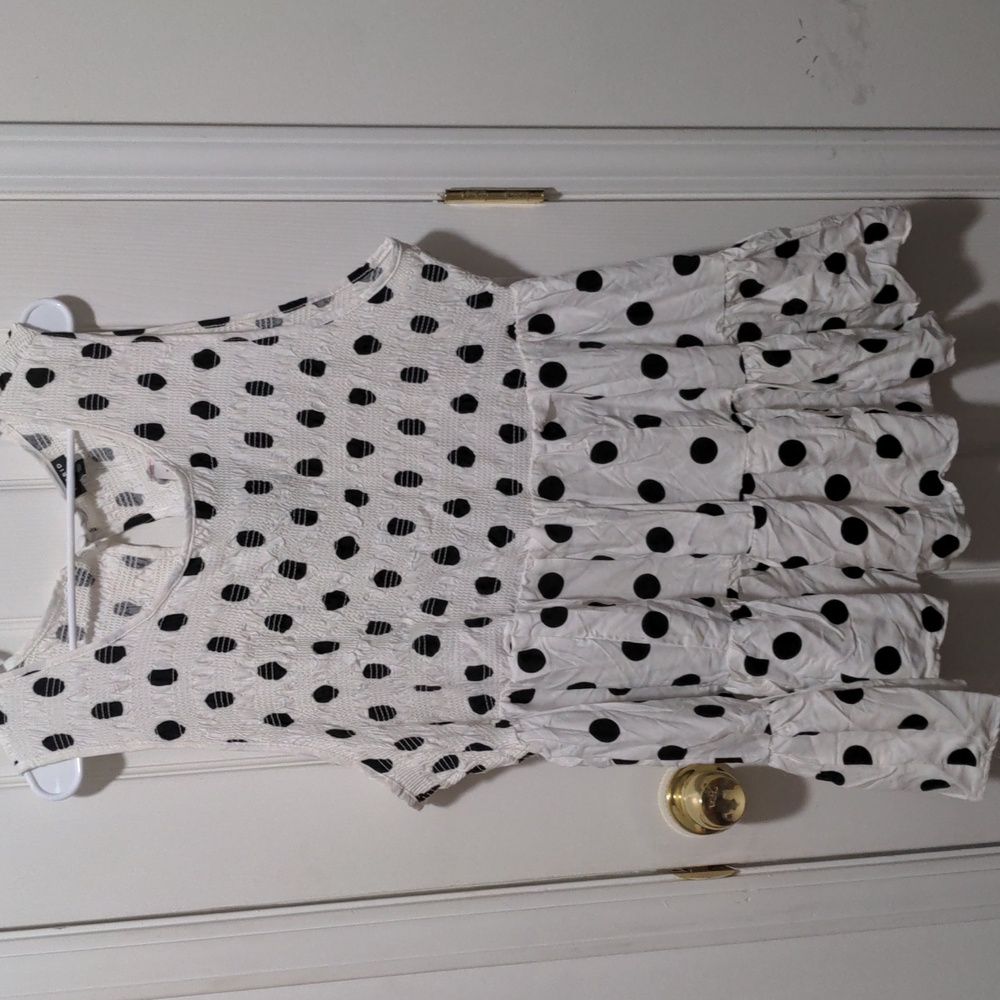Torrid Sleeveless Flowy Blouse with Poka Dots Design